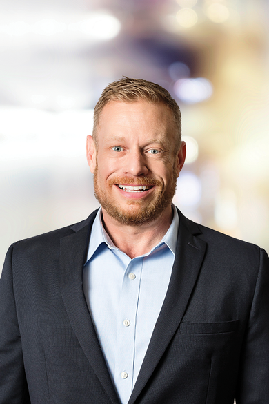Portrait of Adam Linder, REALTOR®.
